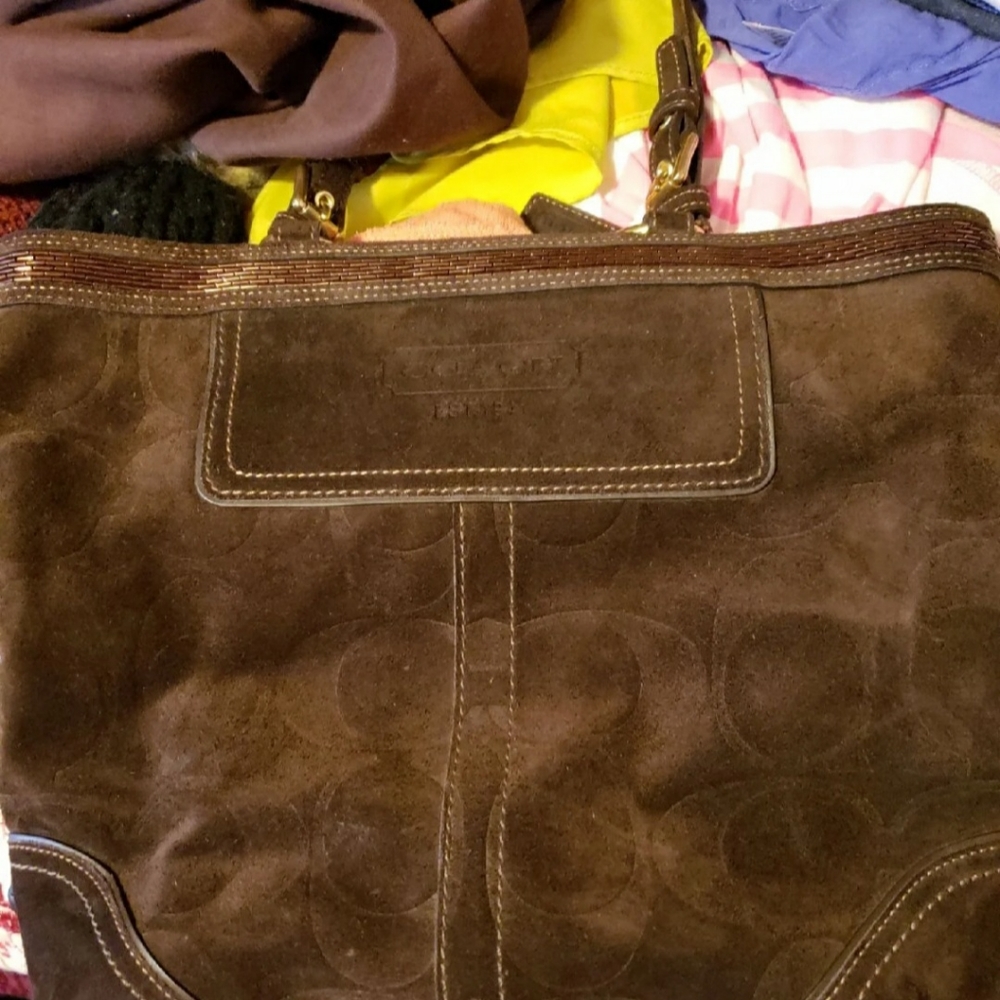 Brown coach purse.